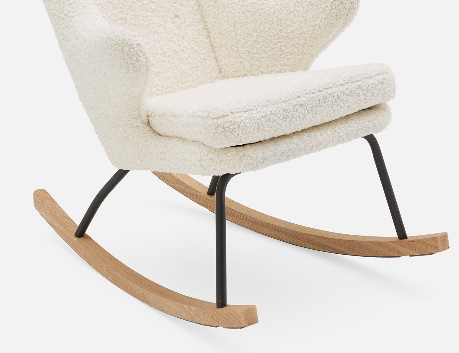GUYAN faux shearling rocking armchair undefined