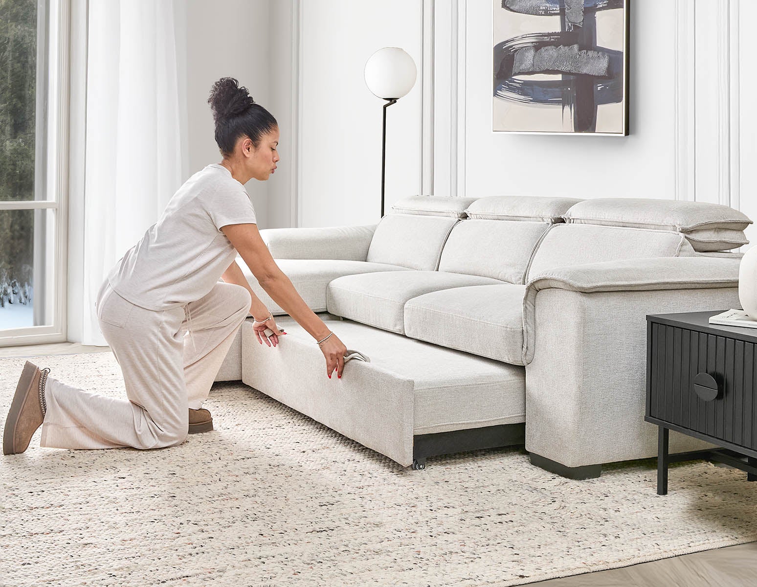 ODETTE contemporary left-facing sectional sofa-bed with storage undefined