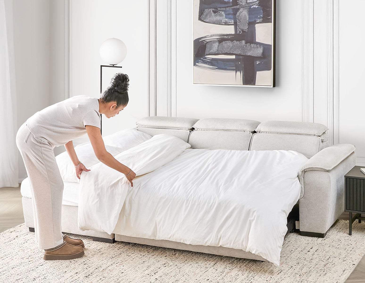 ODETTE contemporary left-facing sectional sofa-bed with storage undefined